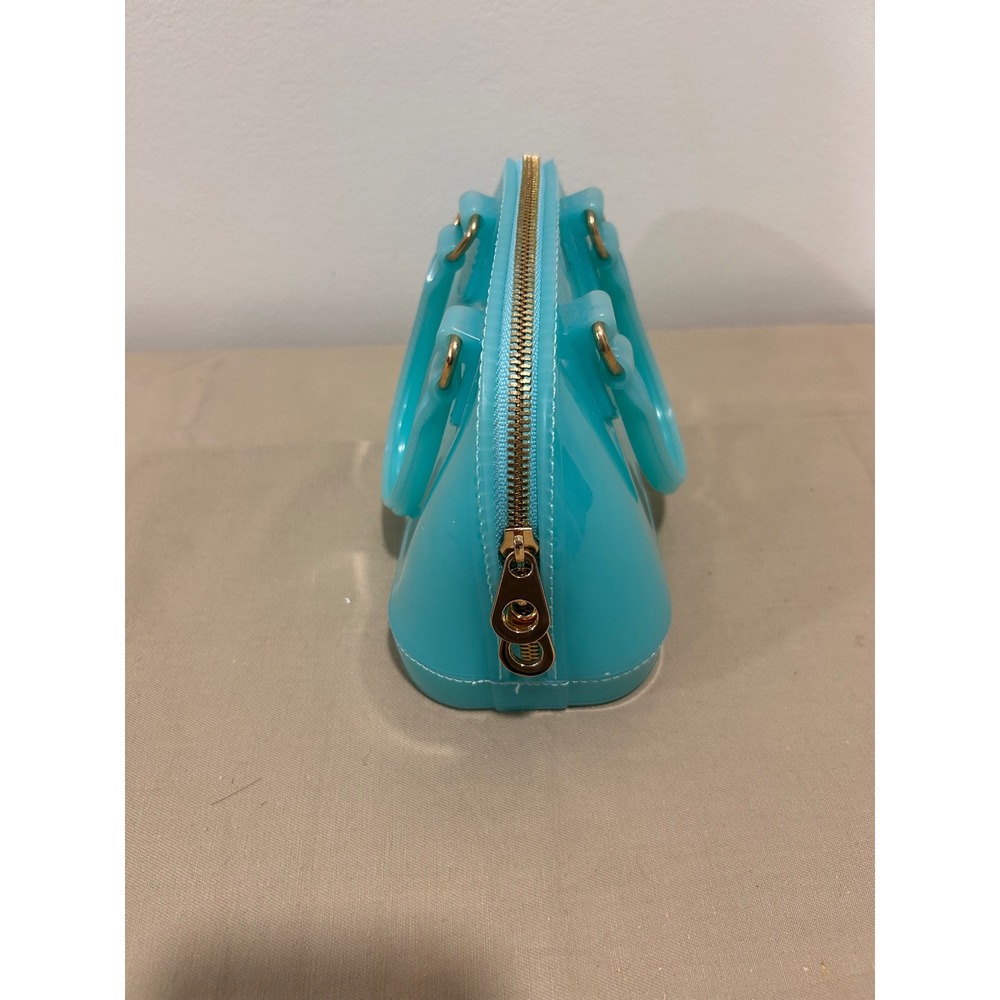 Turquoise handbag is likely a jelly-style mii purse - Picture 3 of 4